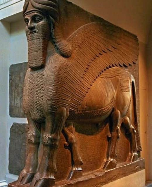 Magnificent ancient Assyrian lamassu — a human-headed winged bull carved in relief, a symbol of the power of the Mesopotamian empires that feature in Ezekiel's prophecies