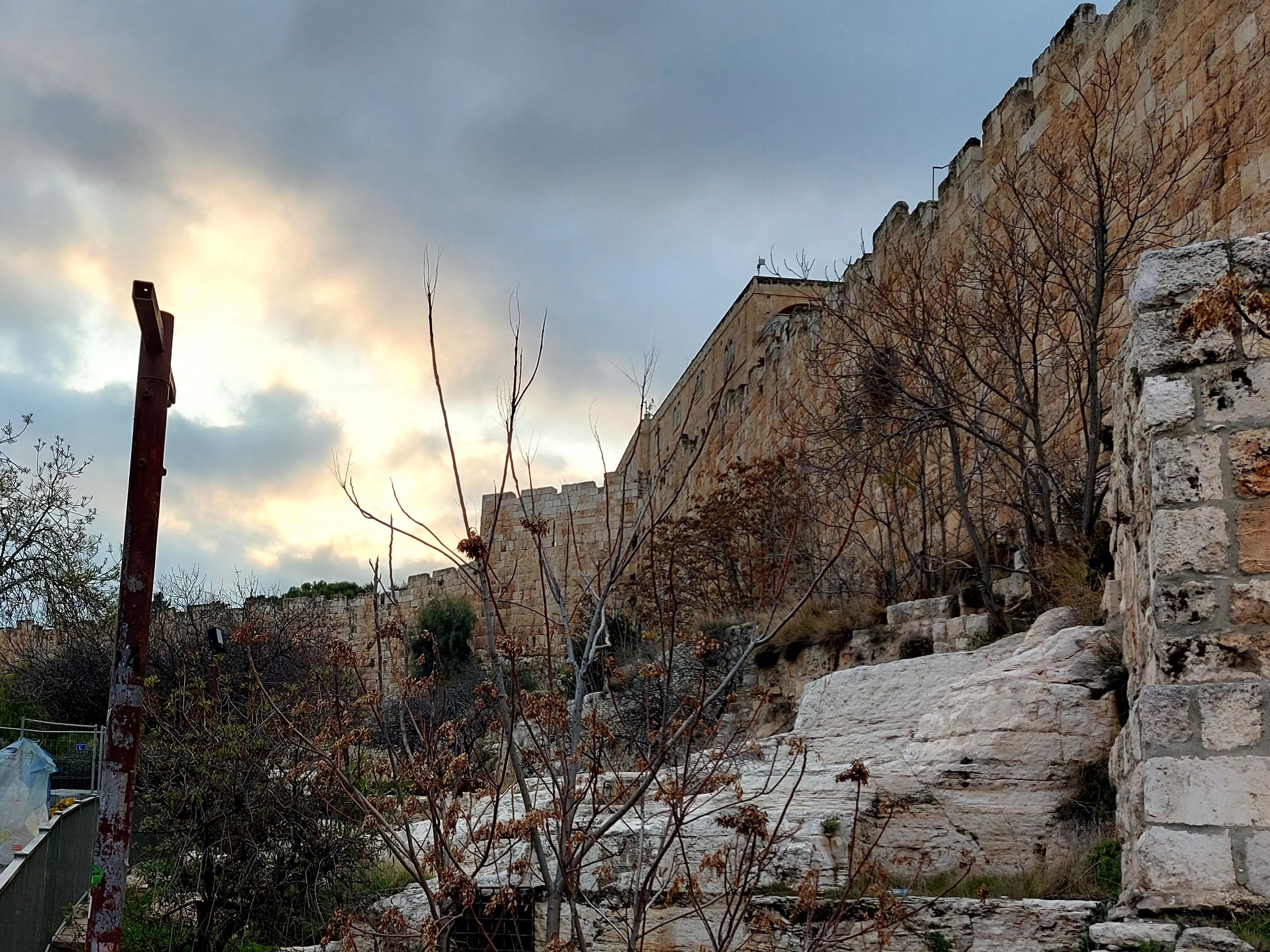 The sun sets over the ancient walls of Jerusalem