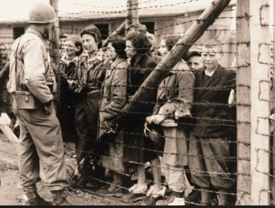 American soldiers liberating Dachau Concentration Camp, April 1945