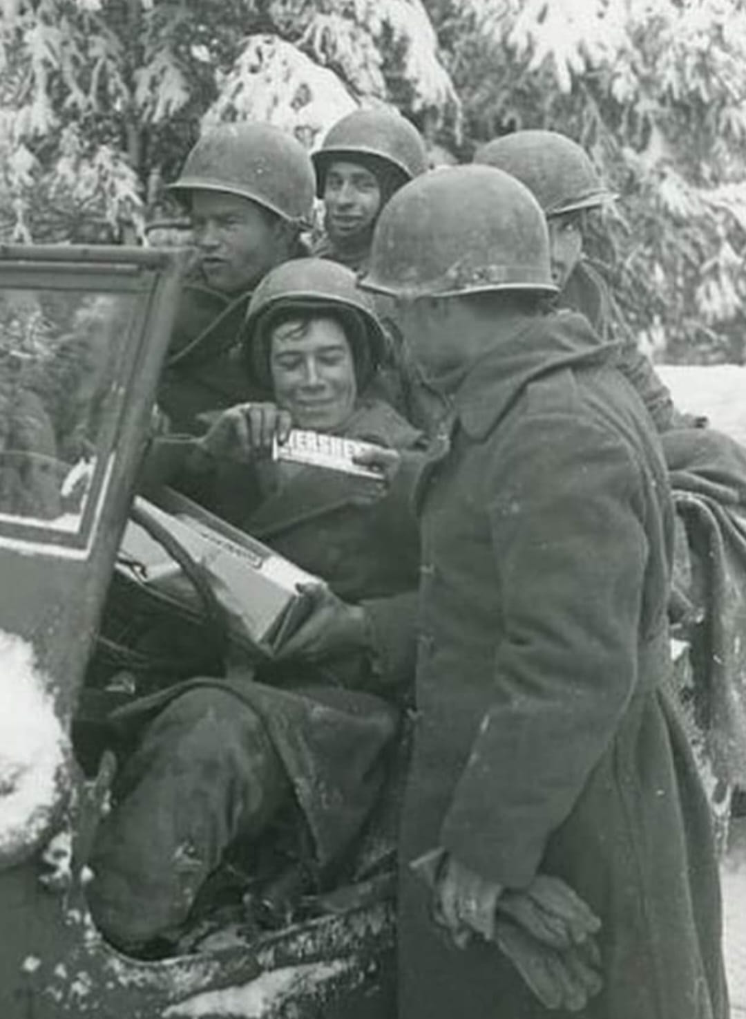 Soldier manning a machine gun position in the snow during the Vosges Mountains campaign